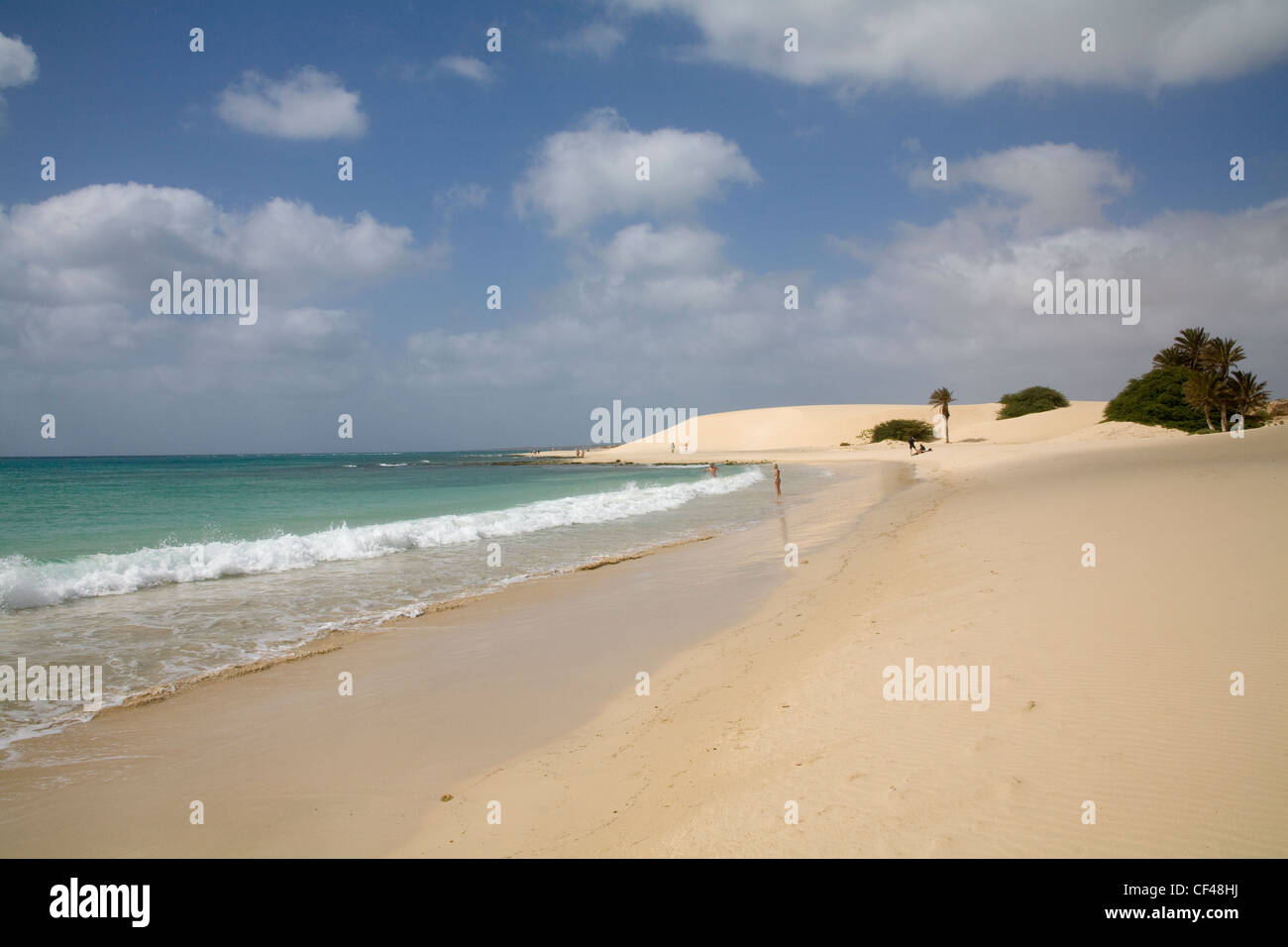 Rabil Boa Vista Cape Verde February Bathers and walkers on beach of Areja de Chaves in this exotic island popular with tourists Stock Photo