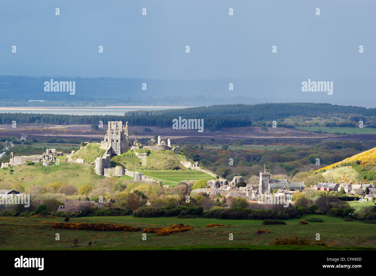 Corfe Castle and village from just outside Kingston in the Purbeck Hills. Stock Photo