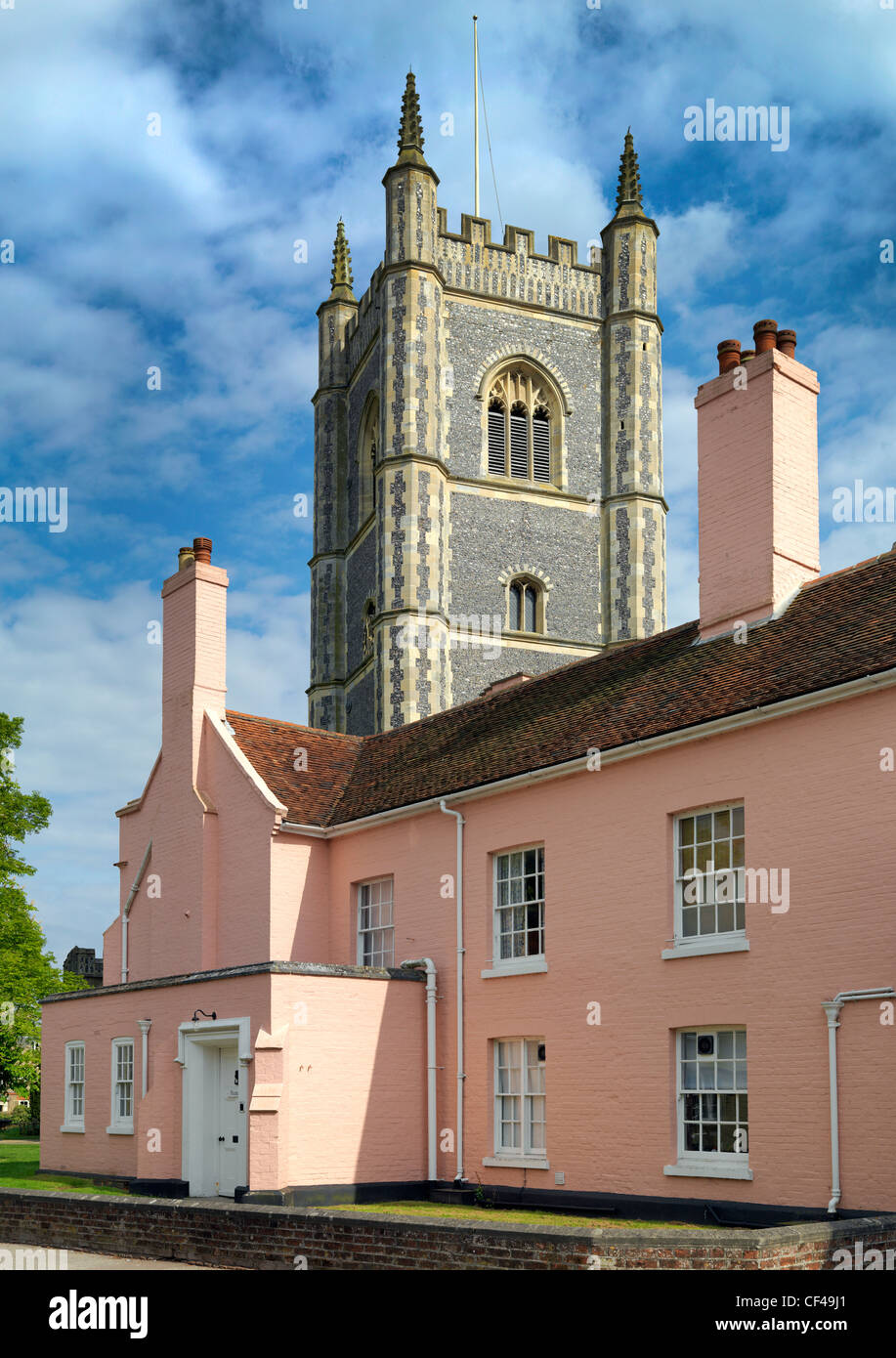 The Vicarage at Dedham, with the spire of St Mary the Virgin in the background. Stock Photo