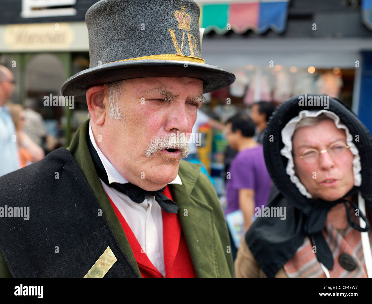 A man and woman dressed in Victorian clothing at the Dickens Festival in Rochester. Stock Photo