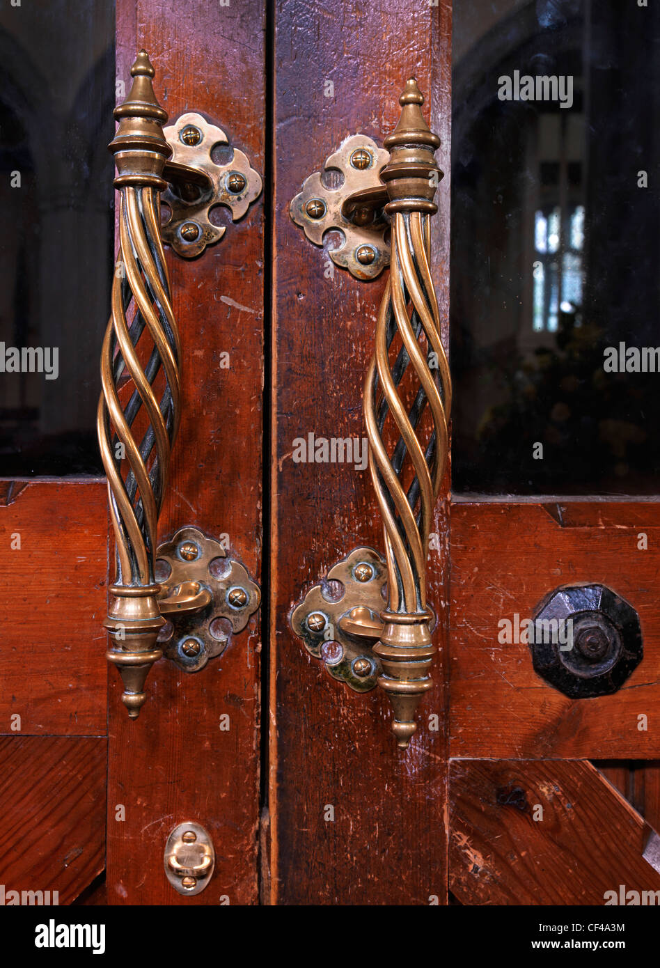 Ornate door handles in St. Mary Magdalene Church in Barkway. Stock Photo