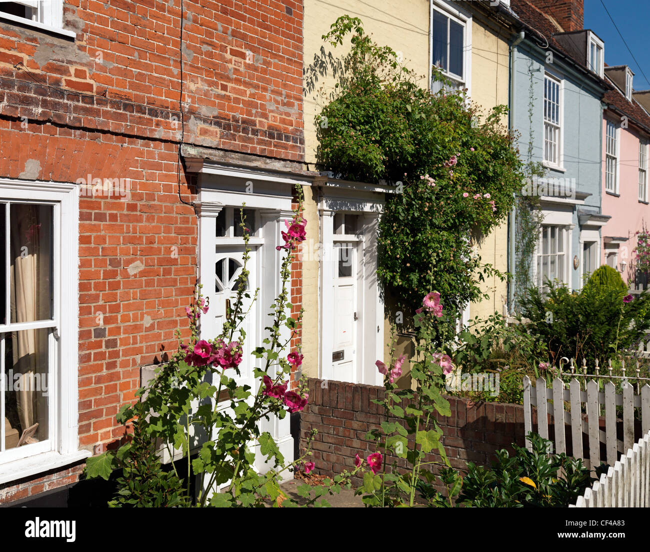 A row of terraced cottages with small gardens. Stock Photo