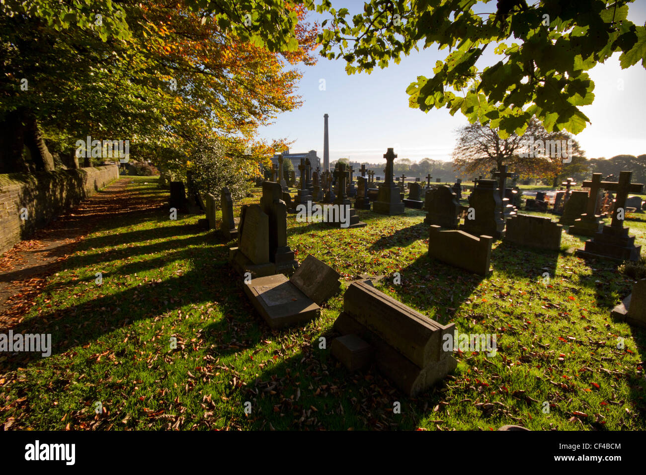Queensbury graveyard looking towards the chimney of Black Dyke Mill. Stock Photo