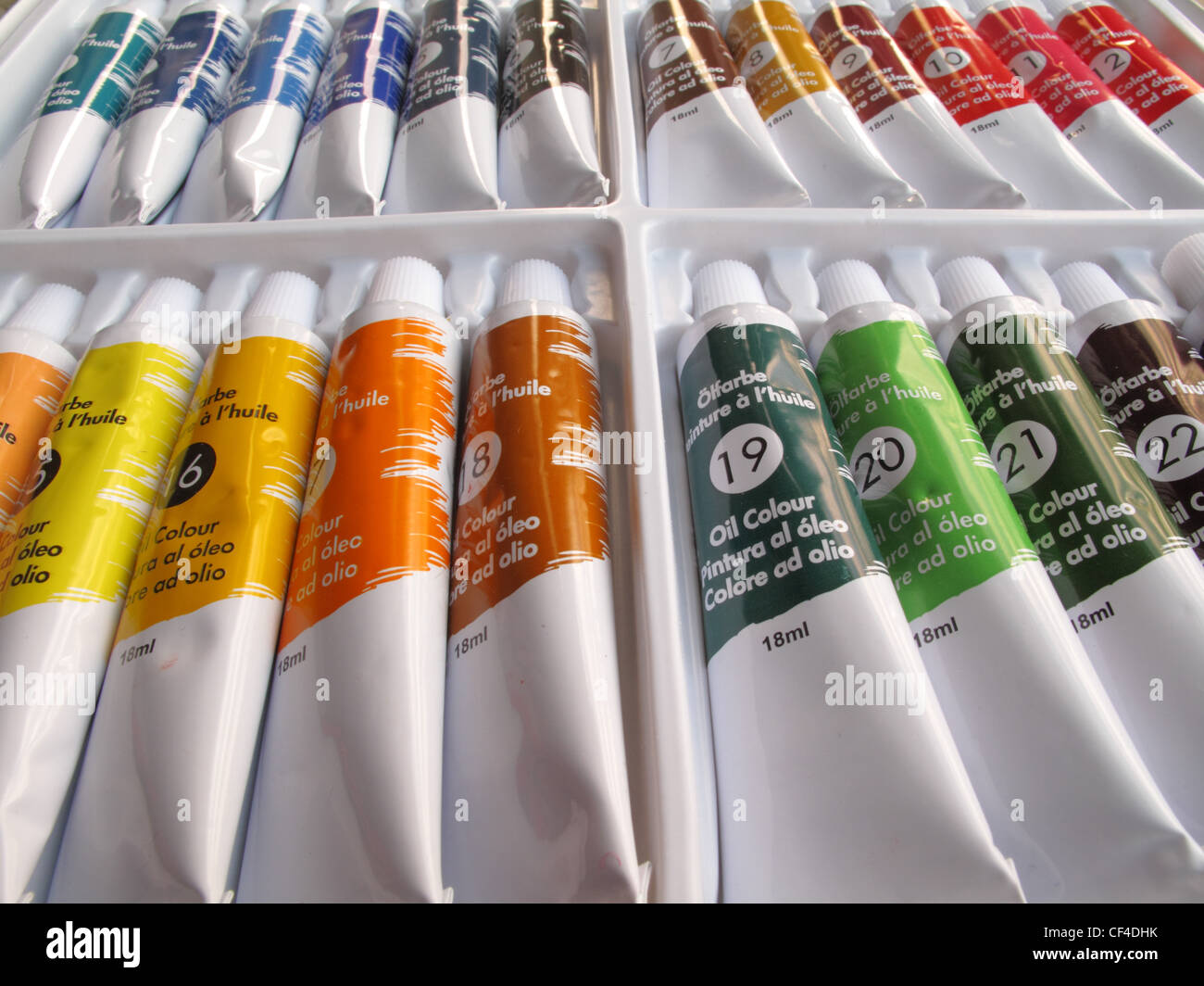 A new box of unused oil paints. Stock Photo