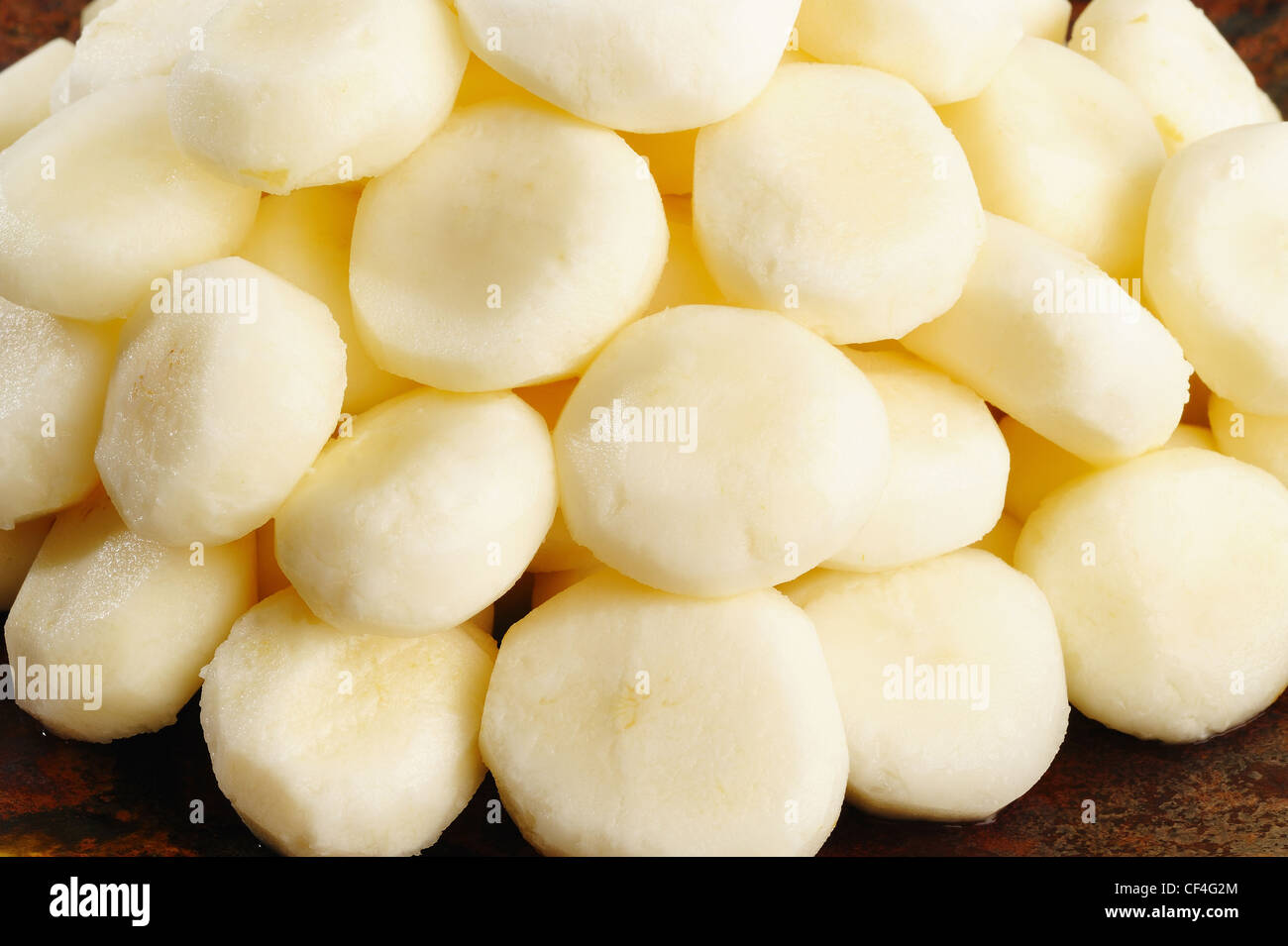 Peel raw chinese water chestnut on dish Stock Photo Alamy
