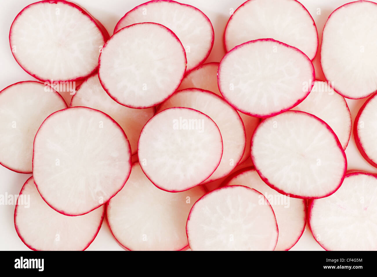 sliced red radish on white background Stock Photo