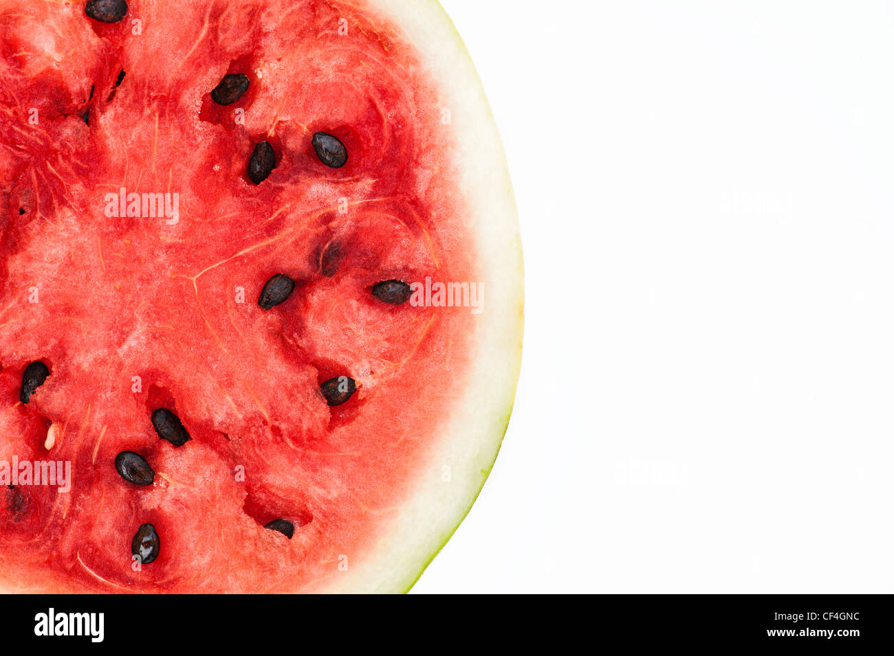 Citrullus lanatus. Watermelon slice on white background Stock Photo