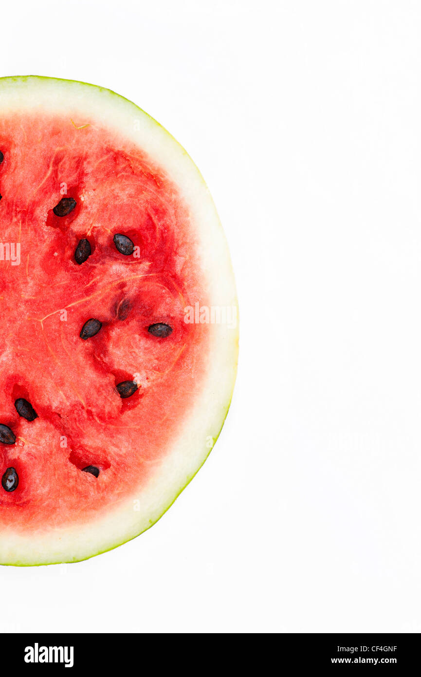Citrullus lanatus. Watermelon slice on white background Stock Photo