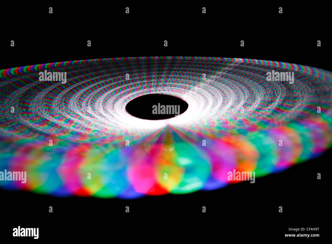 Colorful trace rotating LED in form of a disc on a black background. Stock Photo