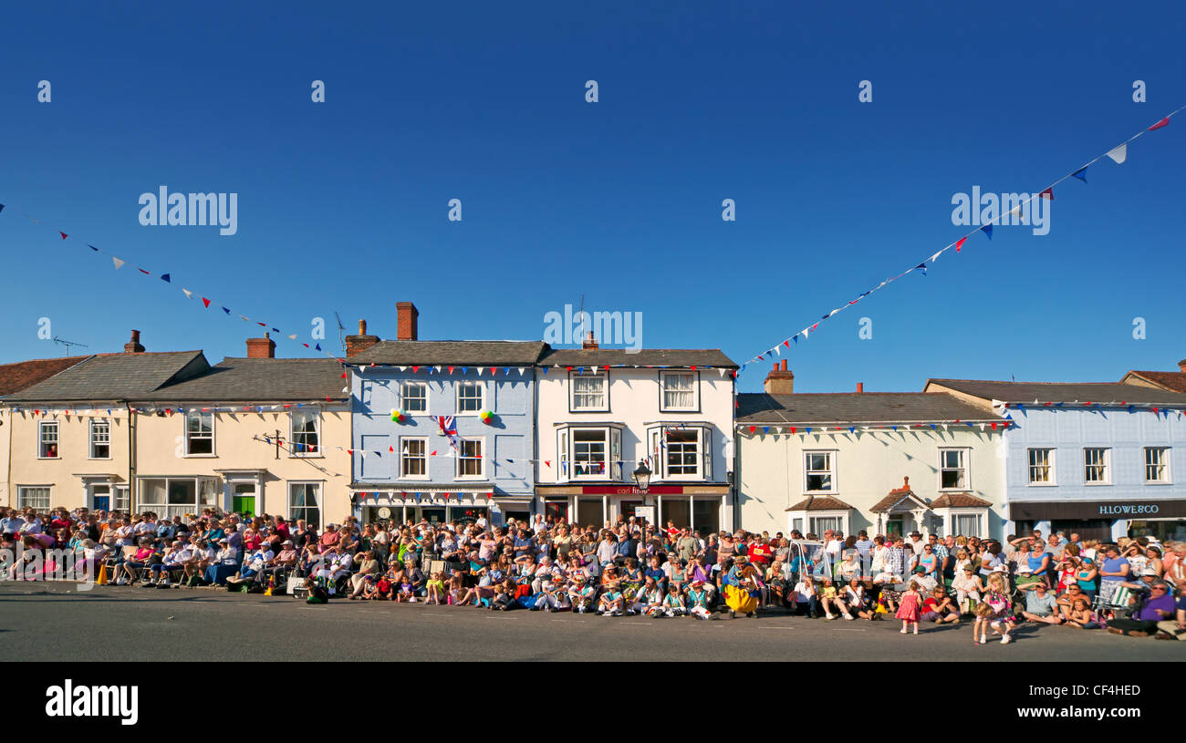 Crowds gather in Watling Street for the centenary Thaxted Morris Dancing Festival. Stock Photo