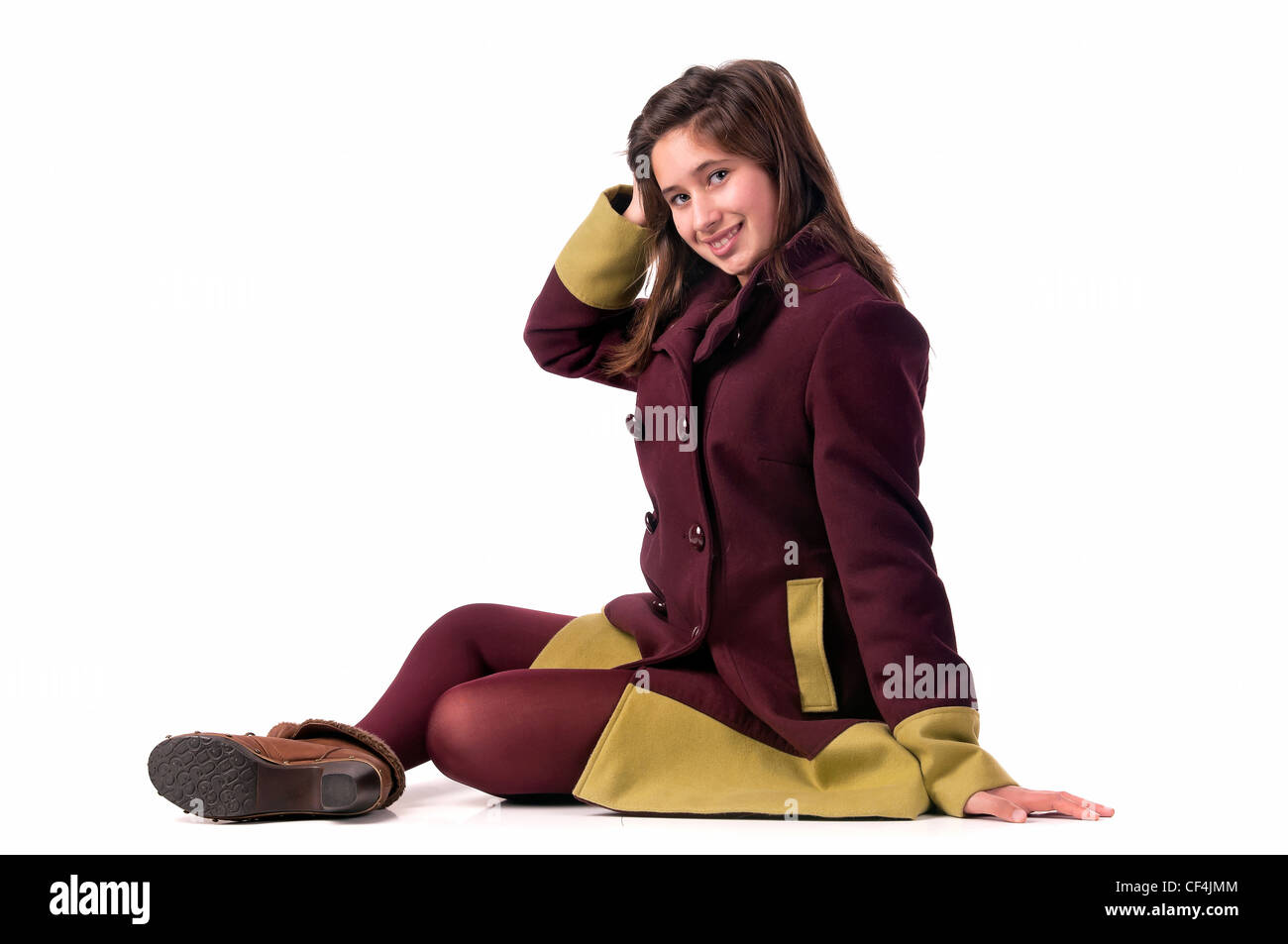 Beautiful young girl posing isolated in white Stock Photo - Alamy