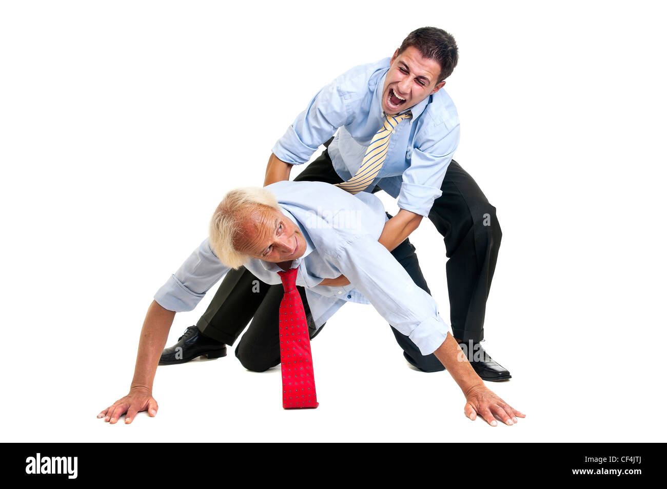 To businessmen wrestling isolated against a white background Stock Photo