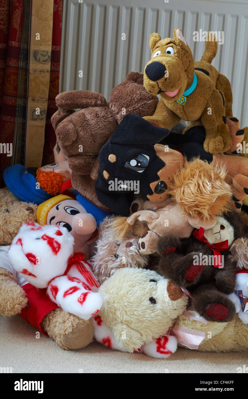 pile of soft cuddly toys ready to declutter and take to charity shop Stock Photo