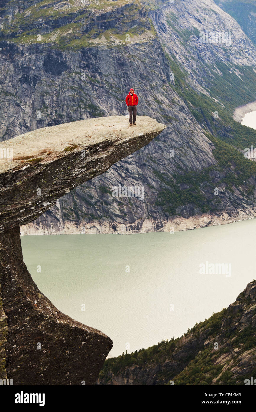 hike in Norway mountains,Trolltunga cliff near Odda Stock Photo