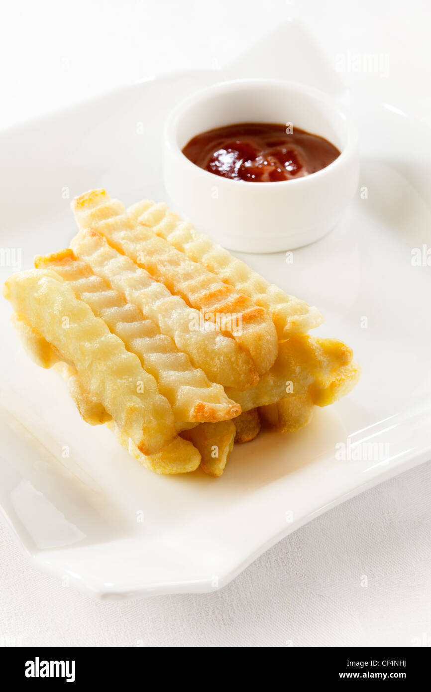 chips and tomato sauce Stock Photo