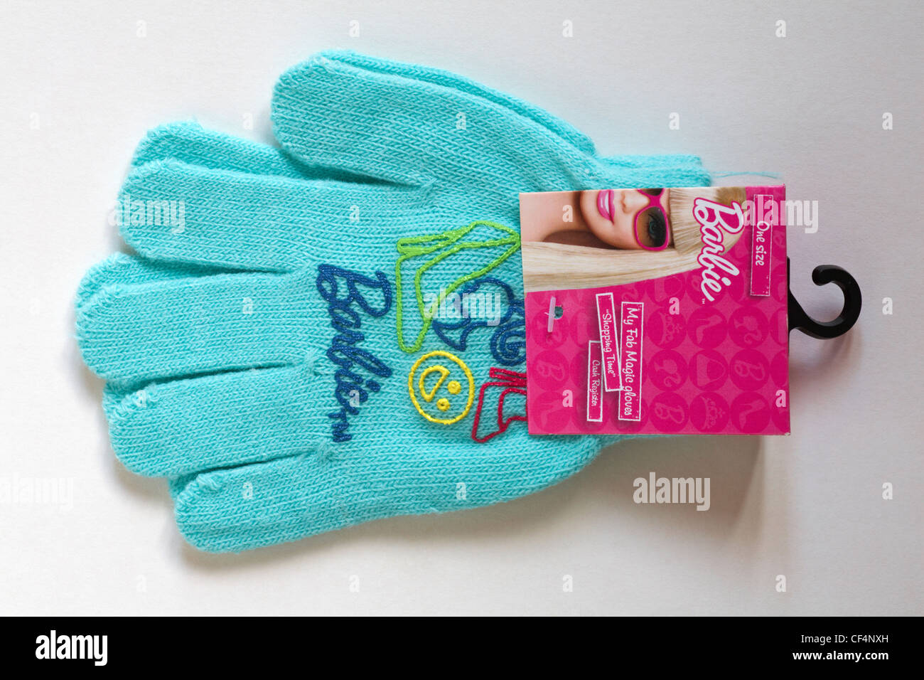turquoise blue Barbie magic gloves isolated on white background Stock Photo Alamy