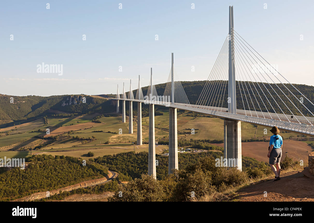 Person at viewpoint for the Viaduc de Millau over the river Tarn, Millau, Aveyron, Midi-Pyrenees, France Stock Photo