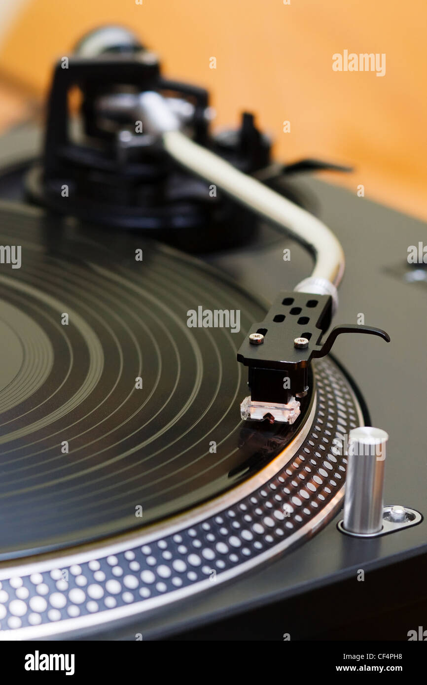 Record player spinning the disc with music Stock Photo Alamy