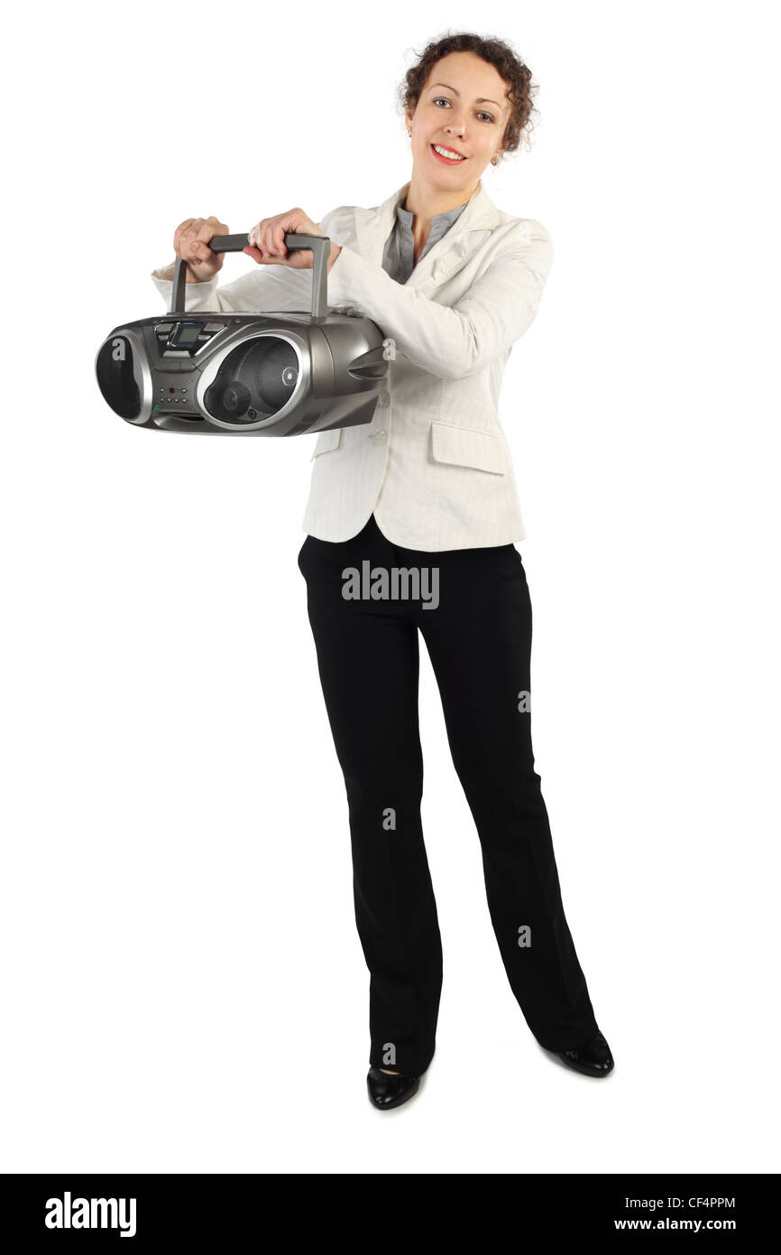 beauty woman in white jacket holding tape recorder and smiling, full body, isolated on white Stock Photo
