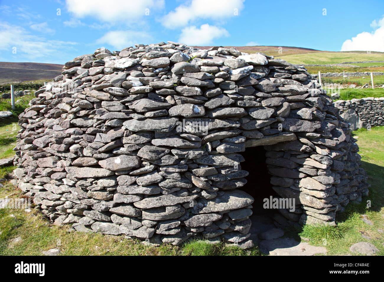A Fahan Beehive Hut, Caher Conor (Cathair na gConchuireach). The hut was probably used as a family dwelling and may date back to Stock Photo
