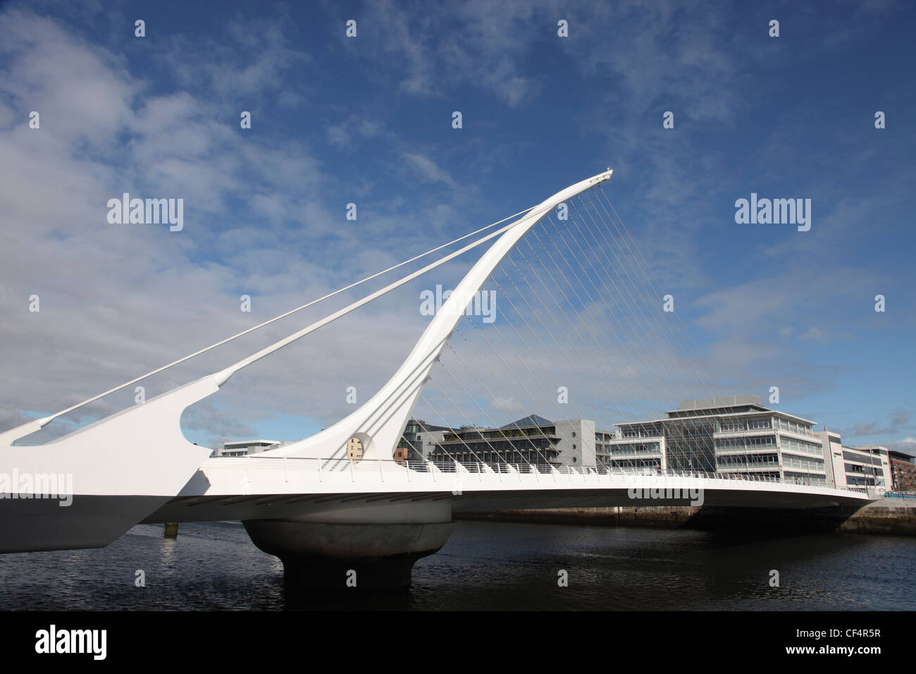 Samuel Beckett Bridge, a cable-stayed bridge that joins Sir John Rogerson's Quay to North Wall Quay across the River Liffey. The Stock Photo