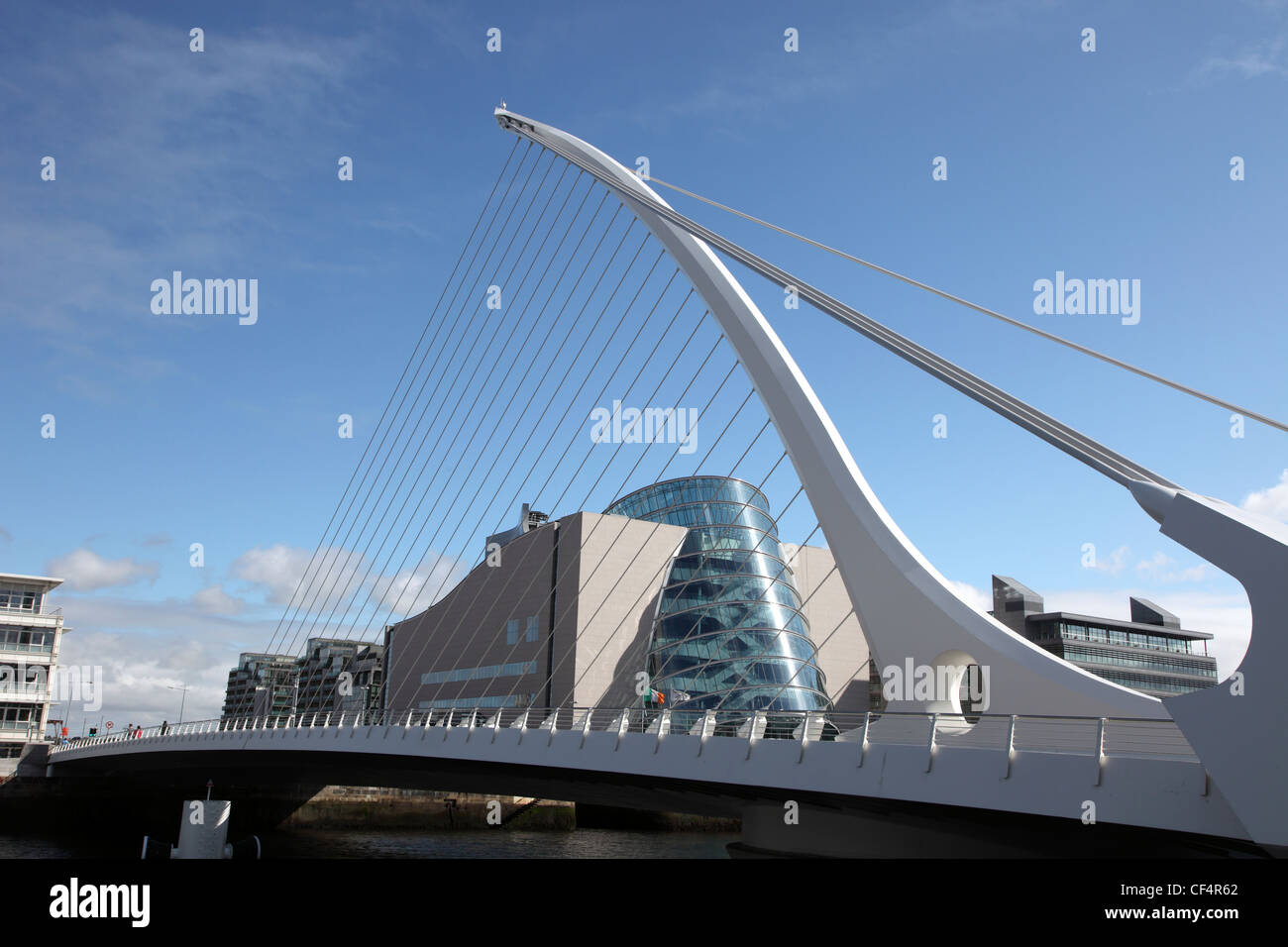 Samuel Beckett Bridge, a cable-stayed bridge designed by Spanish architect Santiago Calatrava that joins Sir John Rogerson's Qua Stock Photo