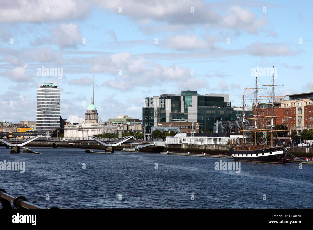 View along the River Liffey towards Custom House Quay from the South Quays featuring Liberty Hall, Customs House, the chq Buildi Stock Photo