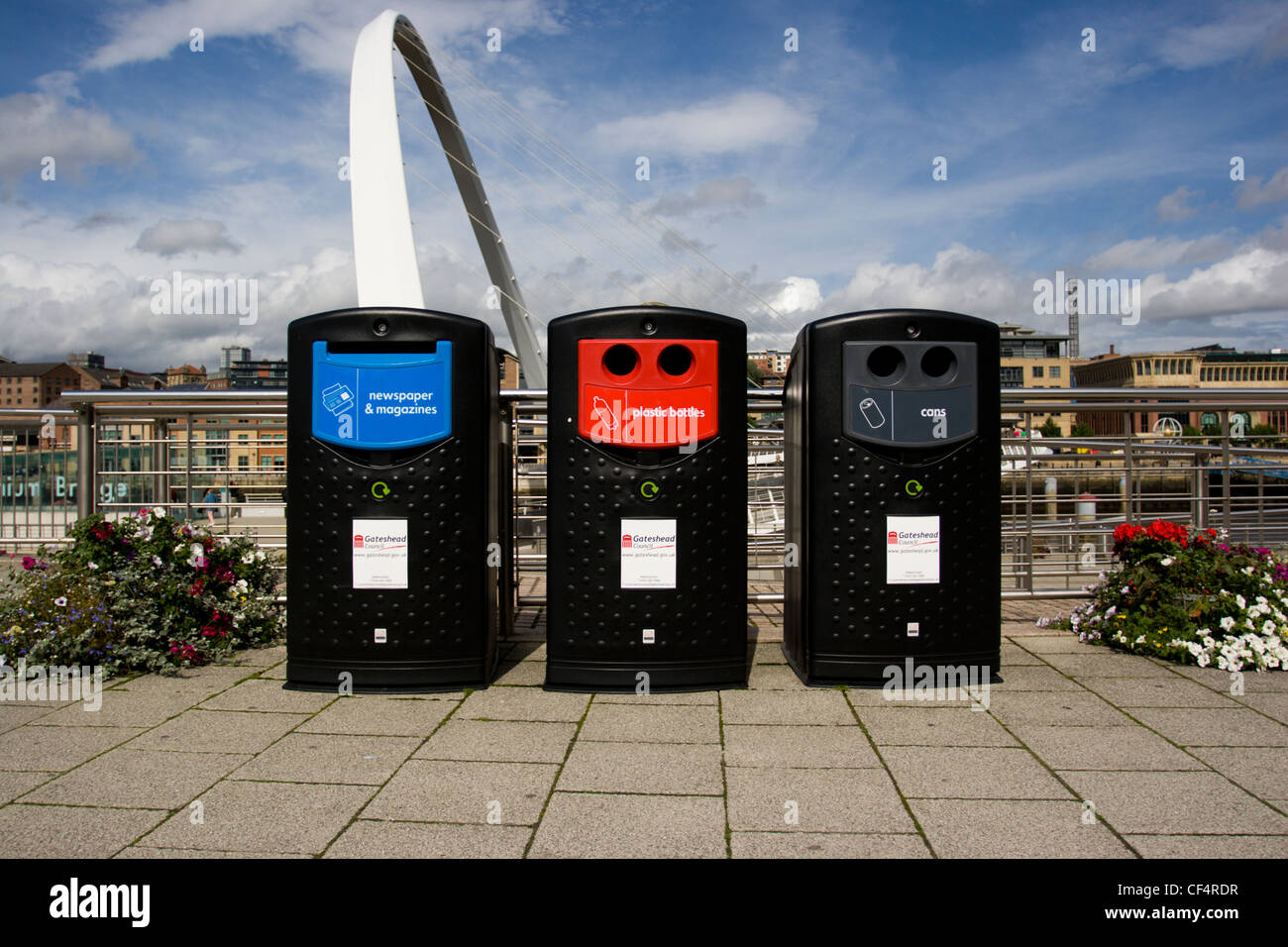 Recycling bins on the quayside in Gateshead with the Gateshead