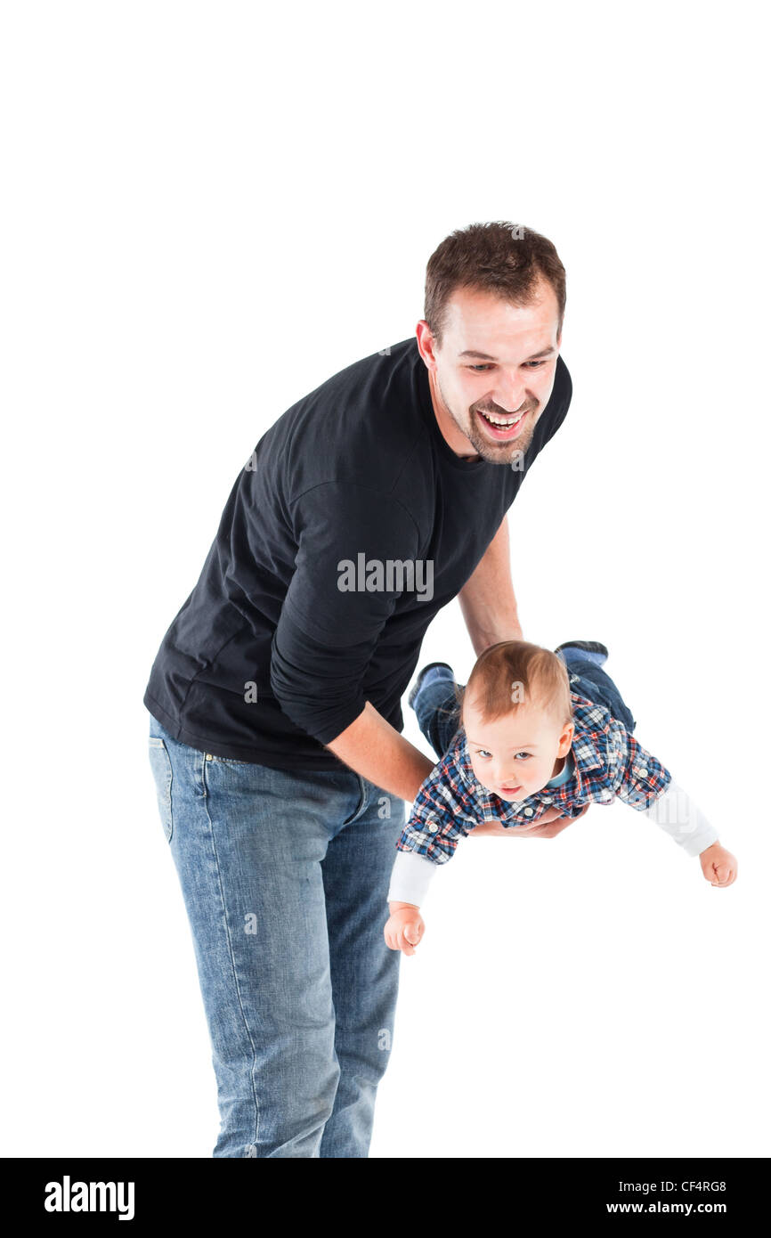 Little baby boy with father. Studio shot. Stock Photo