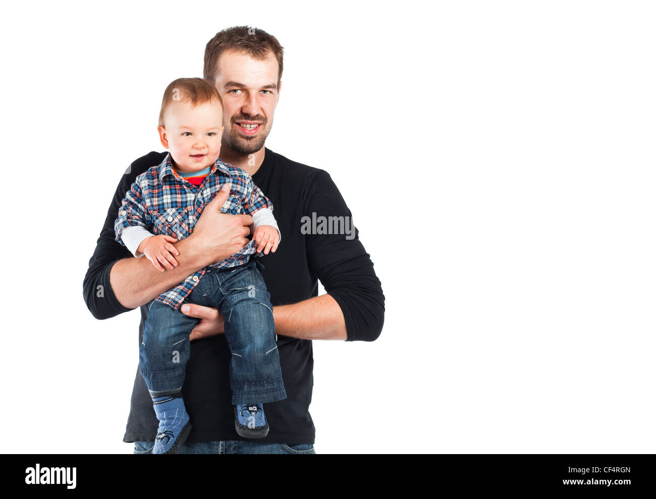 Little baby boy with father. Studio shot. Stock Photo