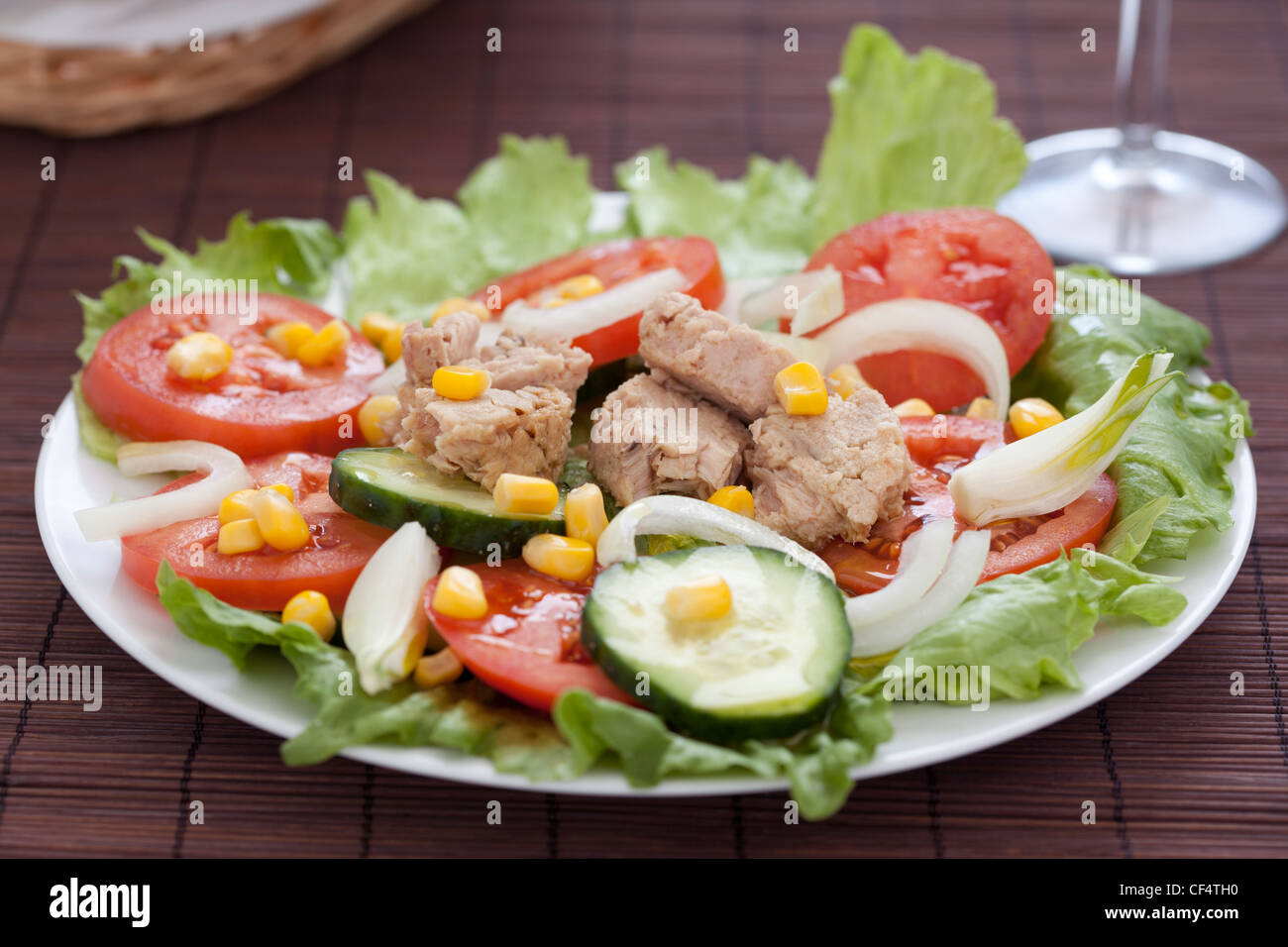 tasty tuna salad lettuce tomato cucumber onion Stock Photo Alamy
