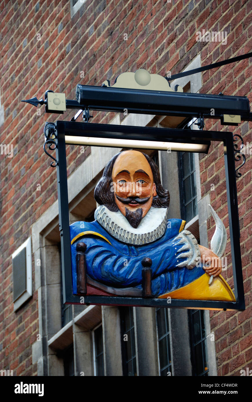 A pub sign featuring a likeness of William Shakespeare outside Shakespeare's Head pub in Carnaby Street. Stock Photo