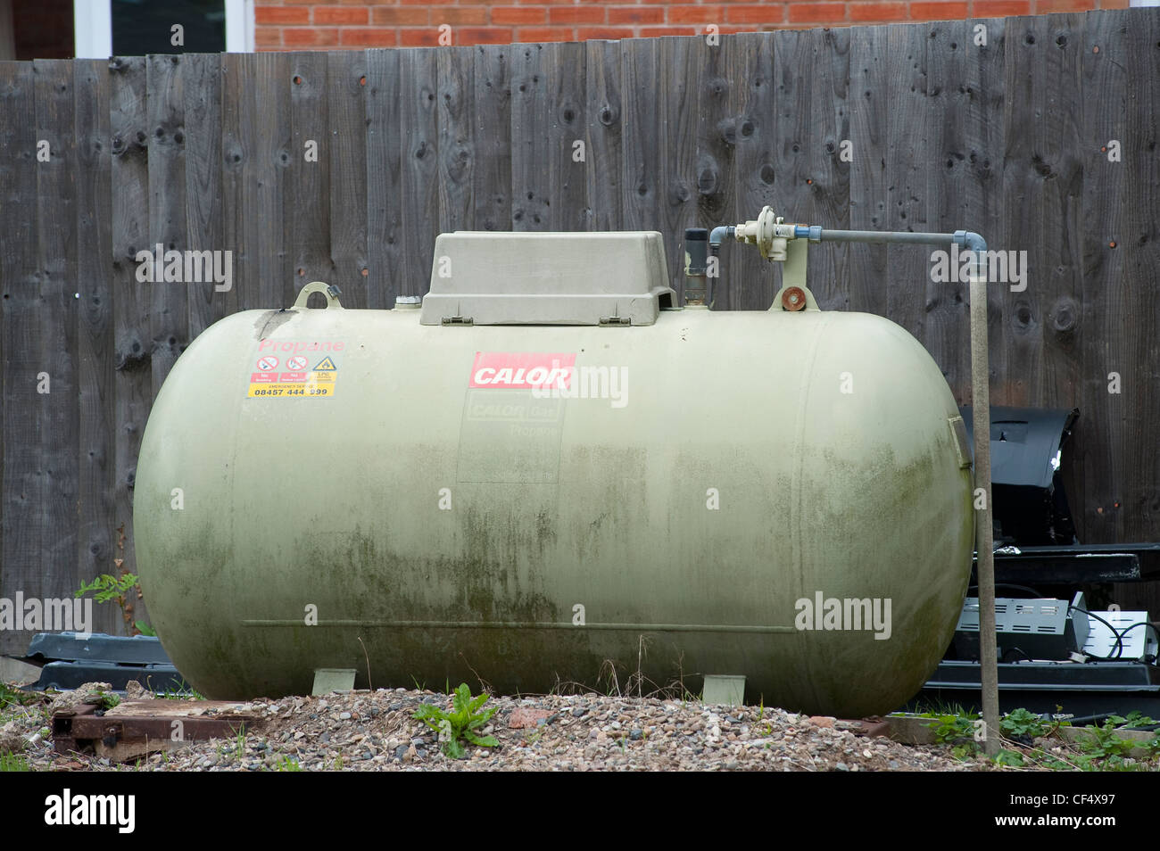 Above ground bulk tank housing LPG for domestic heating fuel in England. Stock Photo