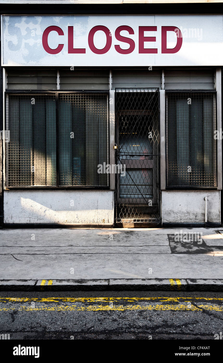 Front of a high street shop which is CLOSED down - Concept Stock Photo