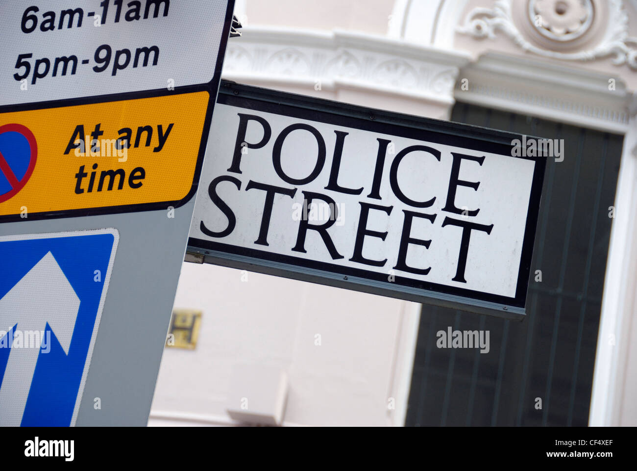 'Police Street' street sign and traffic control signs. Stock Photo