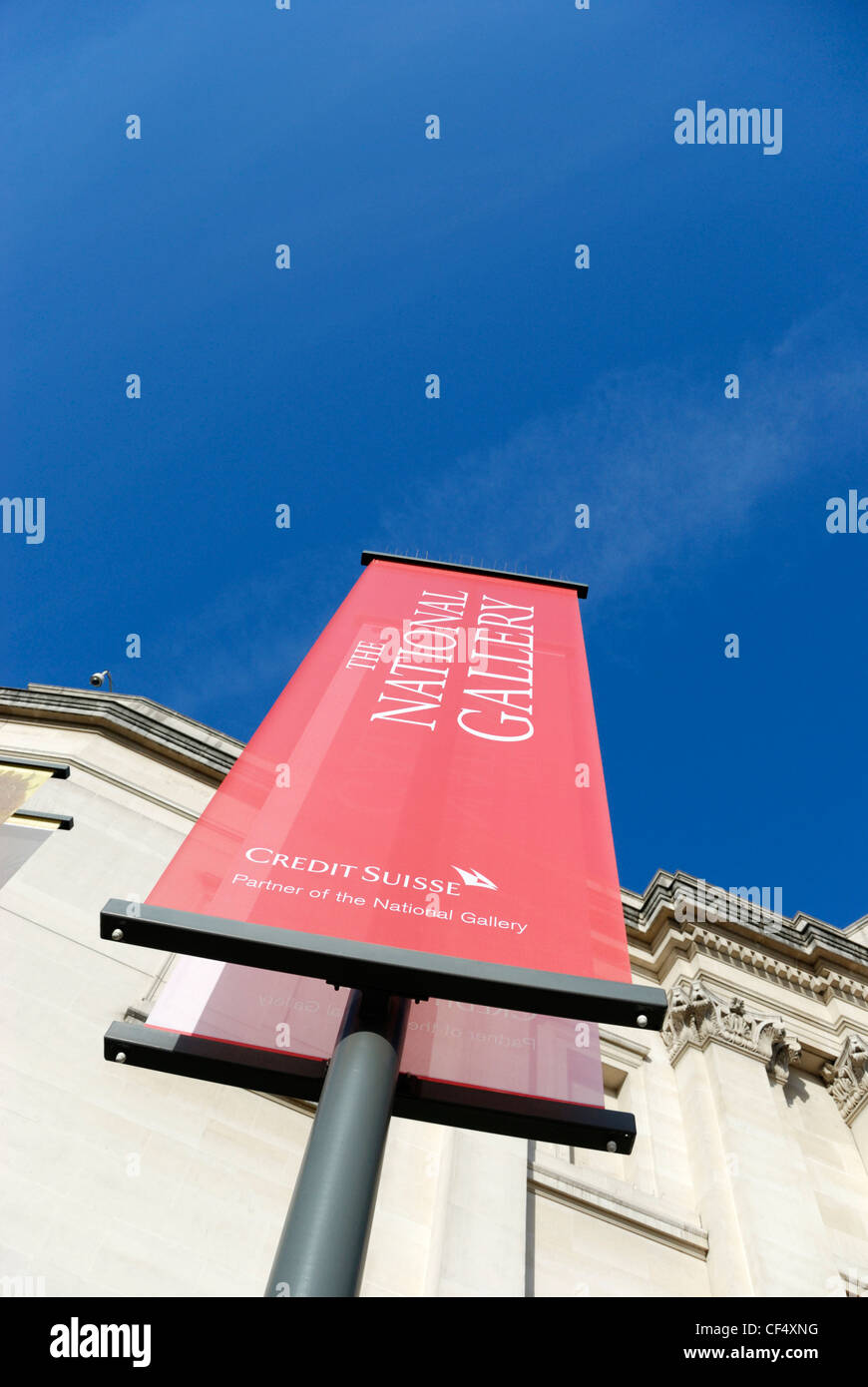 A Red banner outside the Sainsbury Wing of the National Gallery in Trafalgar Square. Stock Photo