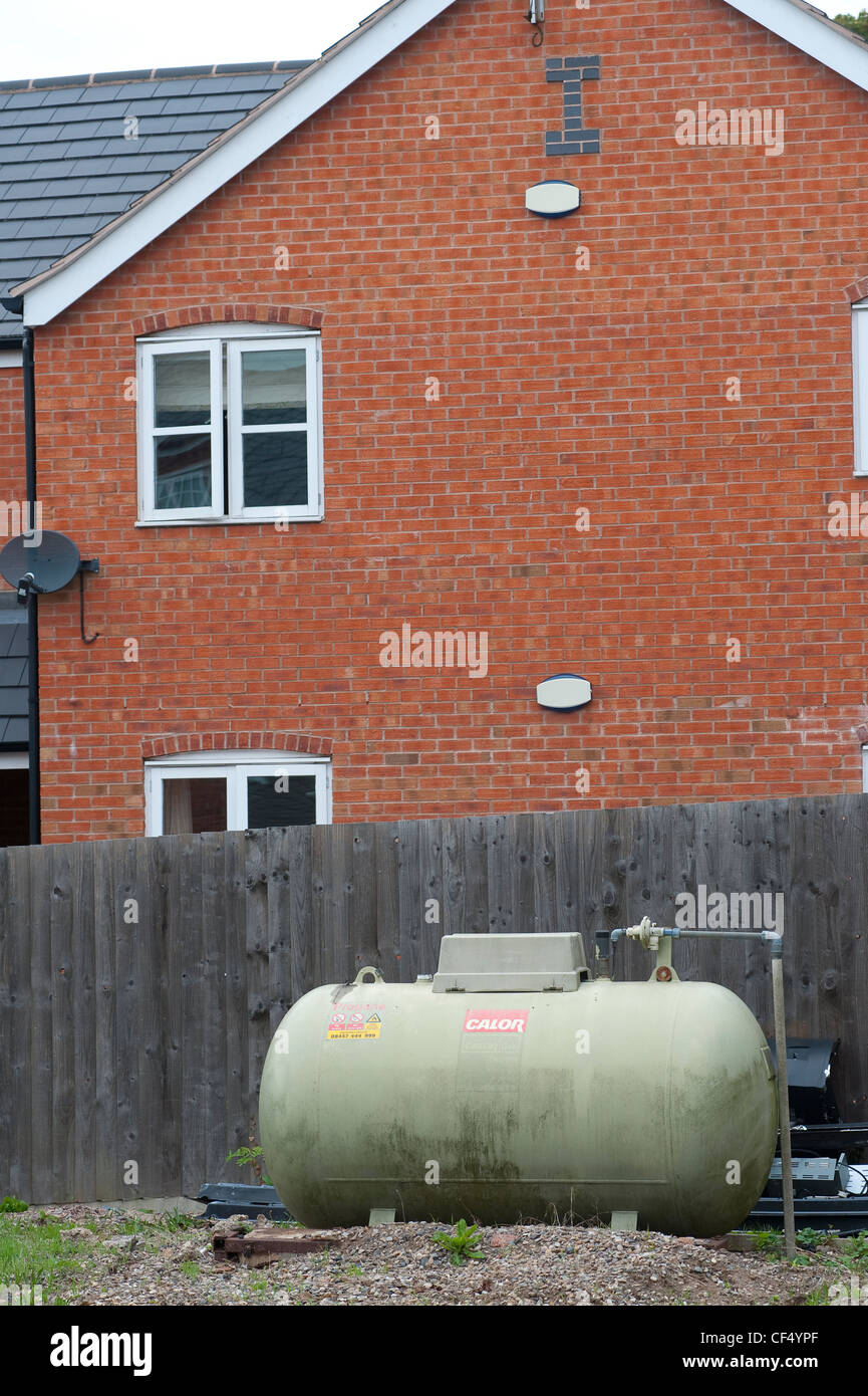 Above ground bulk tank housing LPG for domestic heating fuel in England. Stock Photo