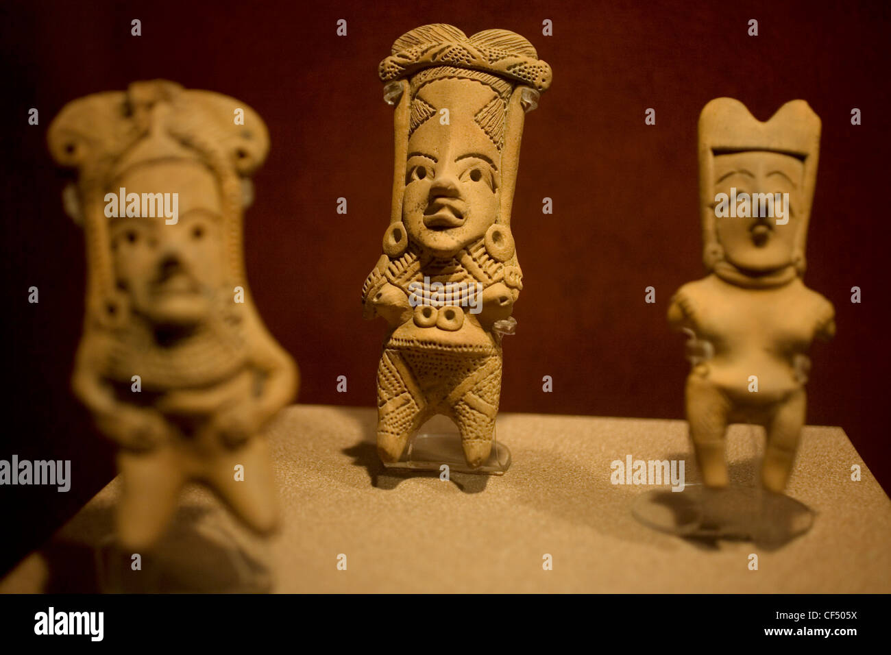 Women clay statuettes are displayed in the National Museum of Anthropology in Mexico City. Stock Photo