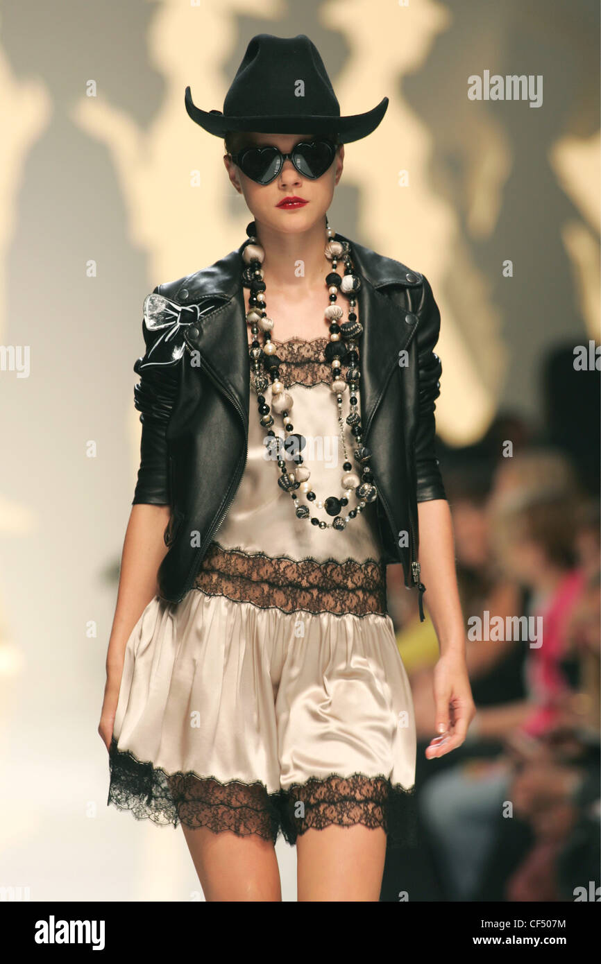 Moschino Milan Ready to Wear S S Western style: model wearing black leather jacket over satin and lace slip dress, accessorised Stock Photo - Alamy Moschino Milan Ready to Wear S S Western style: model wearing black leather jacket over satin and lace slip dress, accessorised Stock Photo - Alamy
