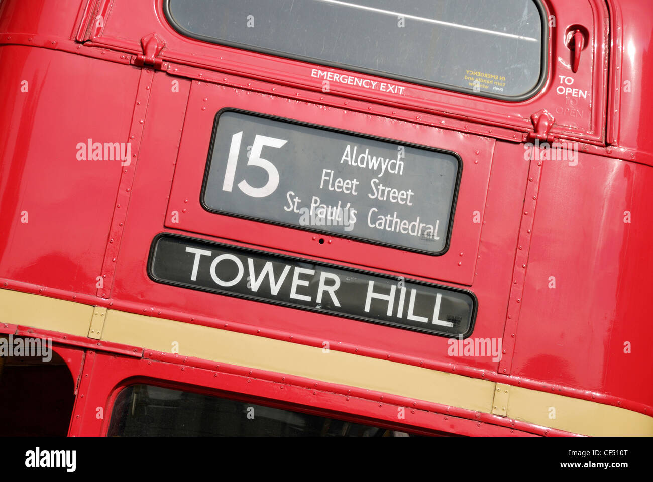 Back of a number 15 red London Routemaster bus displaying 'Tower Hill' as its destination. Stock Photo