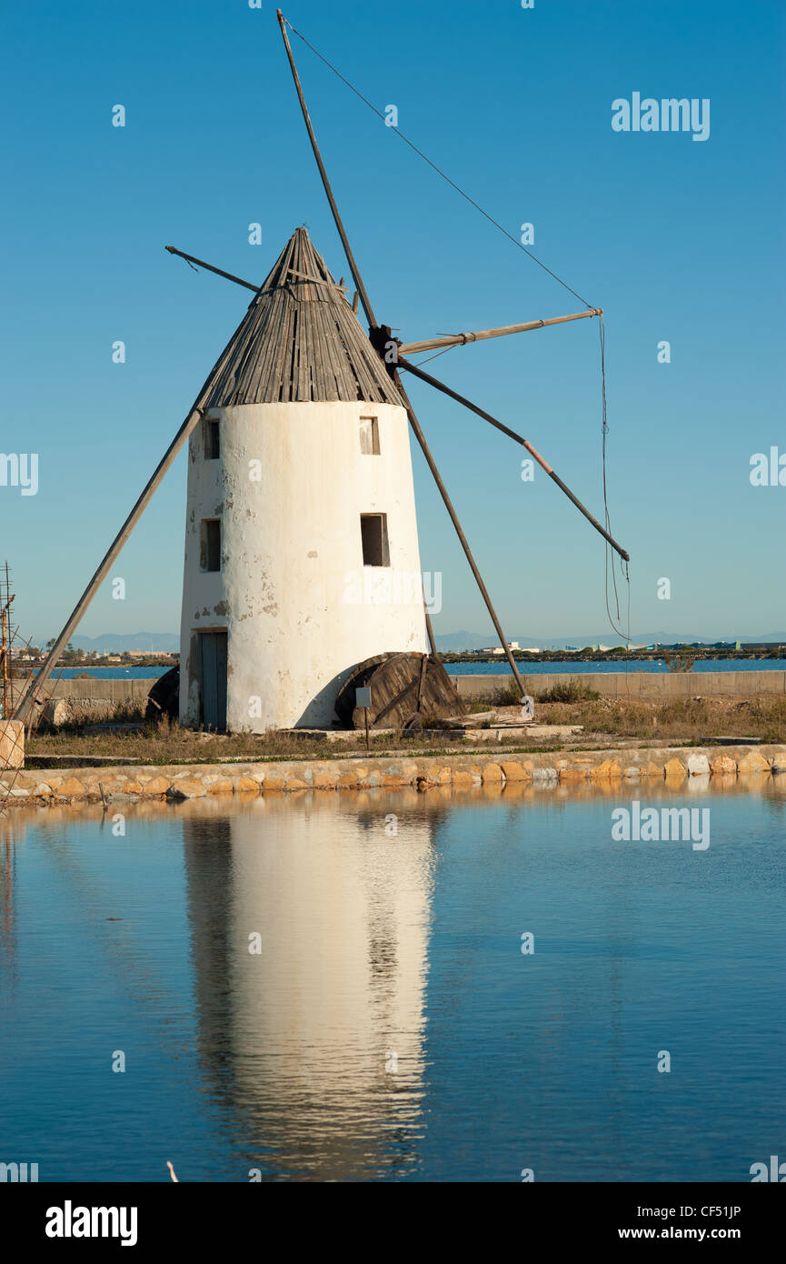 Traditional windmill amids the salt mines in San Pedro, Murcia, Spain Stock Photo