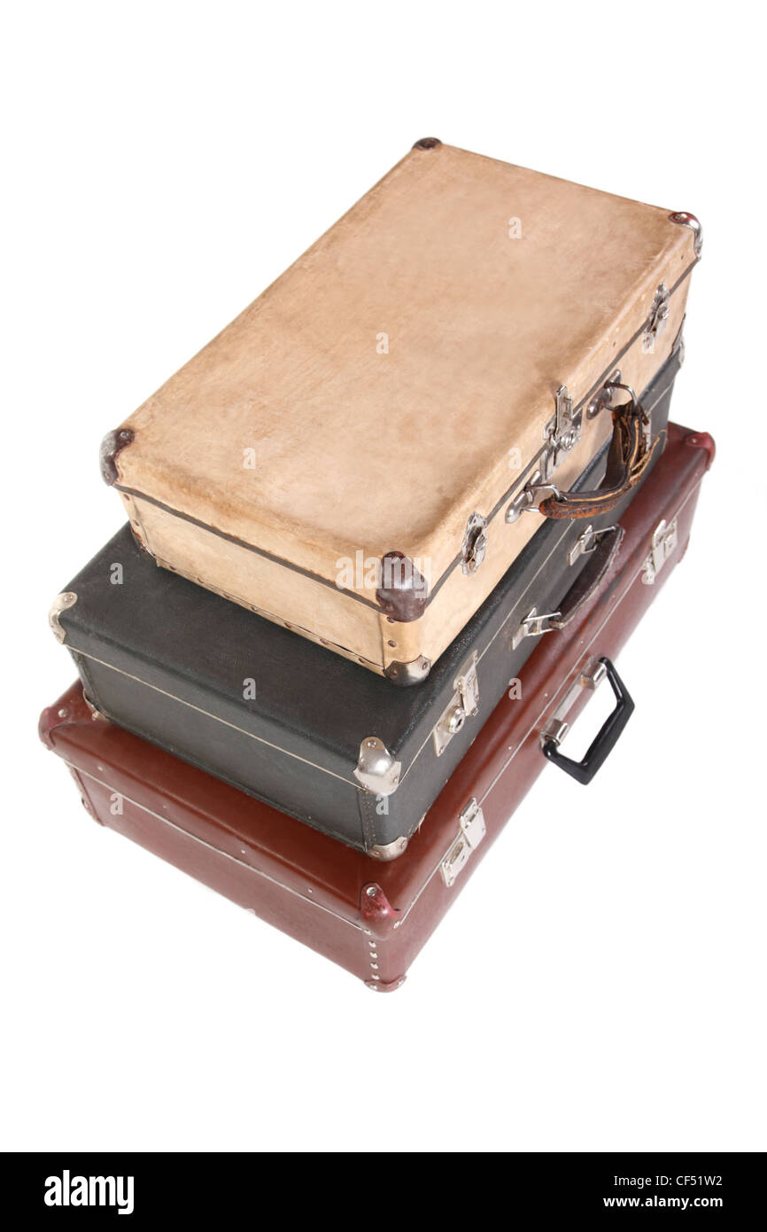 Brown vintage leather suitcase on a wooden deck lying flat viewed
