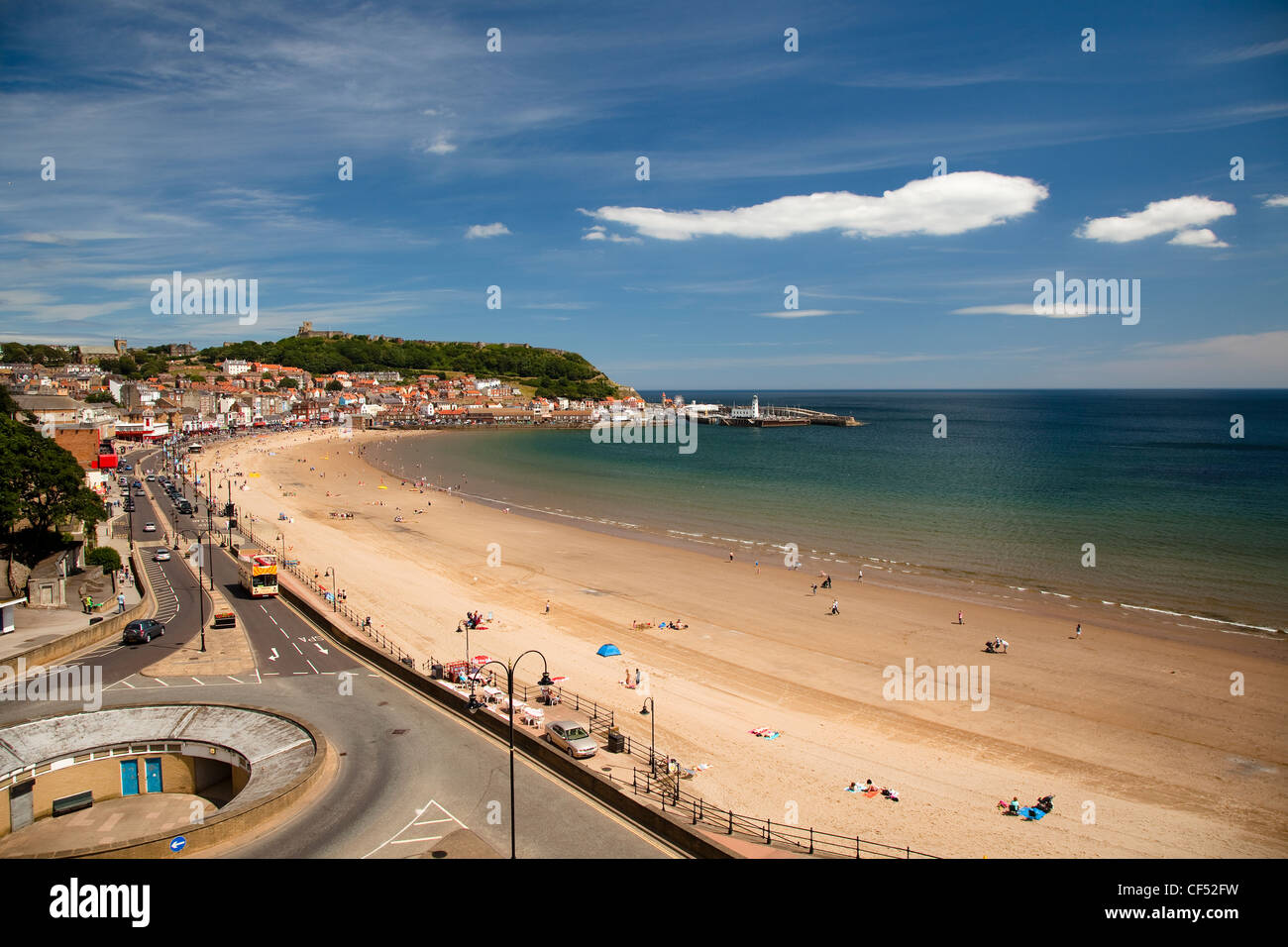 People relaxing on the South Bay beach at Scarborough. Stock Photo