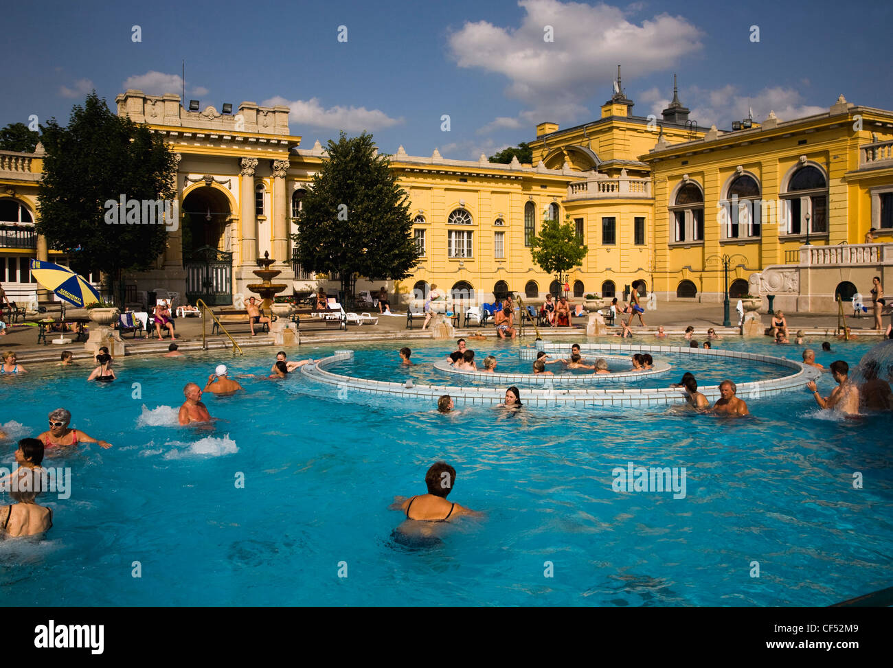People outdoor bathing in summer at szechenyi thermal baths hires
