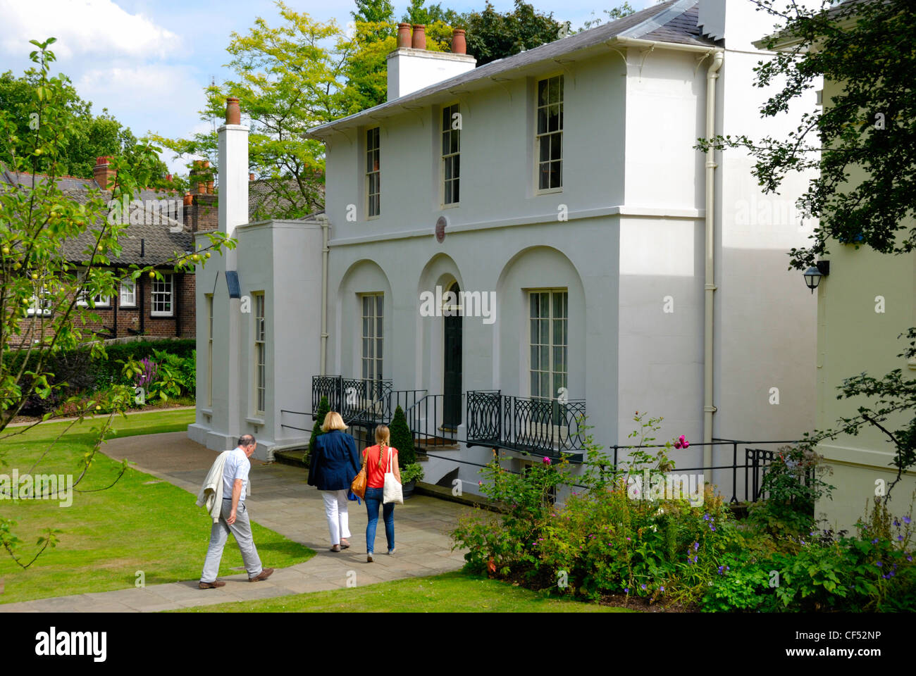 Visitors arriving at Keats House where the poet John Keats lived from 1818 to 1820. Stock Photo