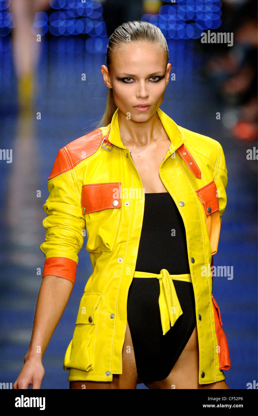 Belstaff Milan Ready to Wear Spring Summer Bright yellow leather jacket  adorned orange patches, stud buttons, patch pockets and Stock Photo - Alamy