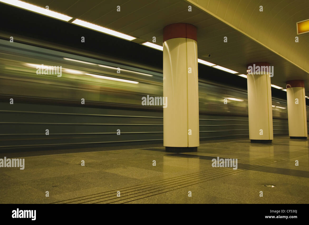 Underground train leaving platform on Metro system Hungary Budapest Hungarian Europe European Central Eastern Buda Pest Obuda Stock Photo
