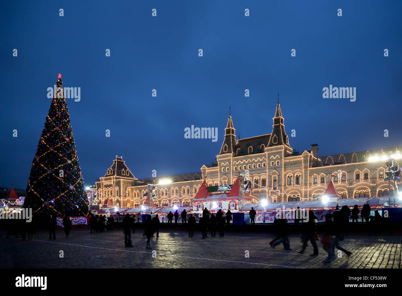 skating-rink on red square in moscow at night. Big New Year tree. GUM trading house Stock Photo