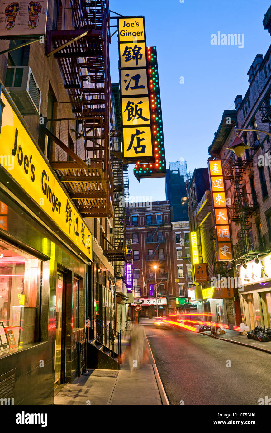 Pell Street in Chinatown, New York City, has many Chinese restaurants such as Joe's Ginger. Stock Photo