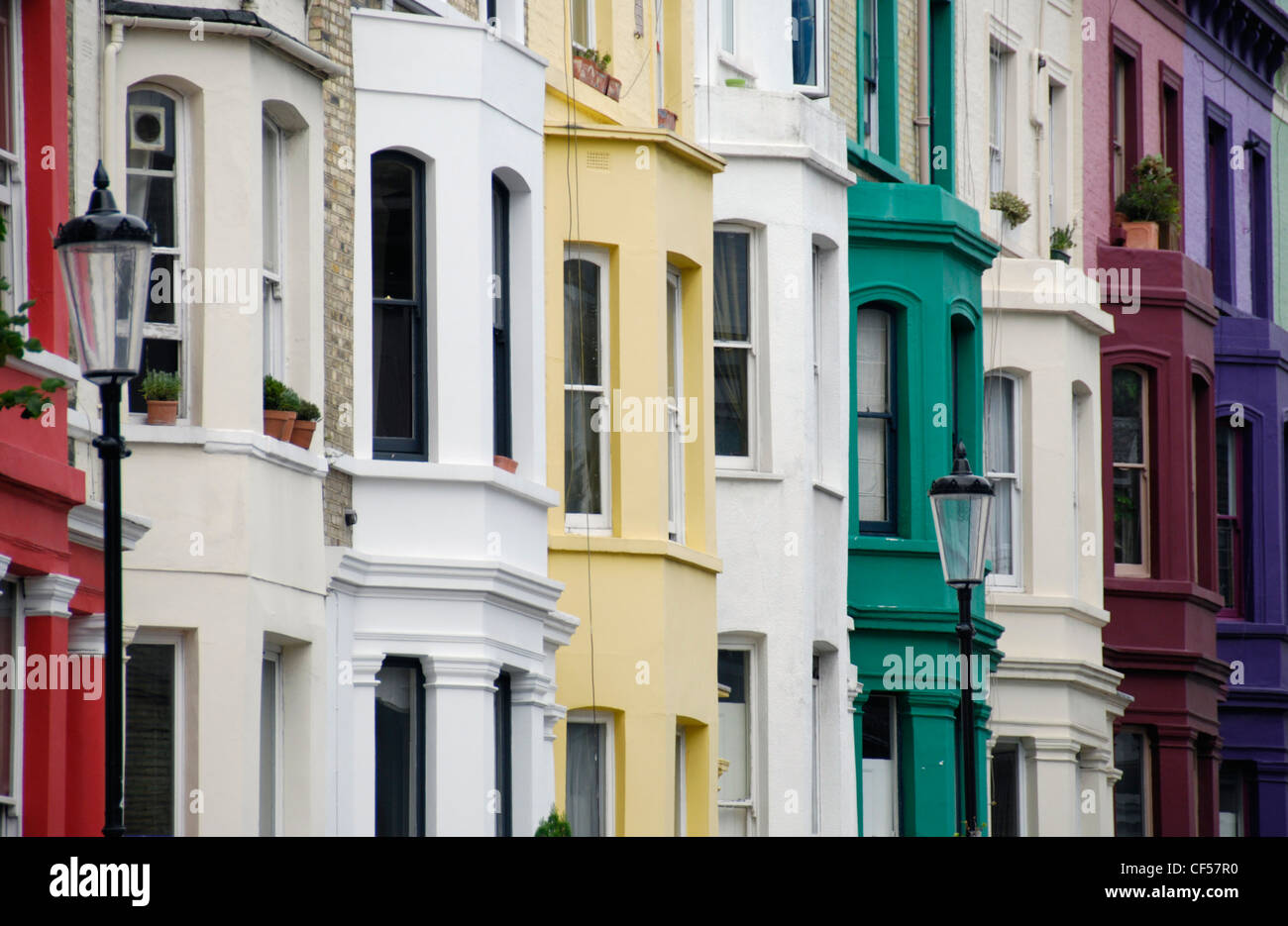 A row of colourful terraced houses at Talbot Road in Notting Hill. Stock Photo